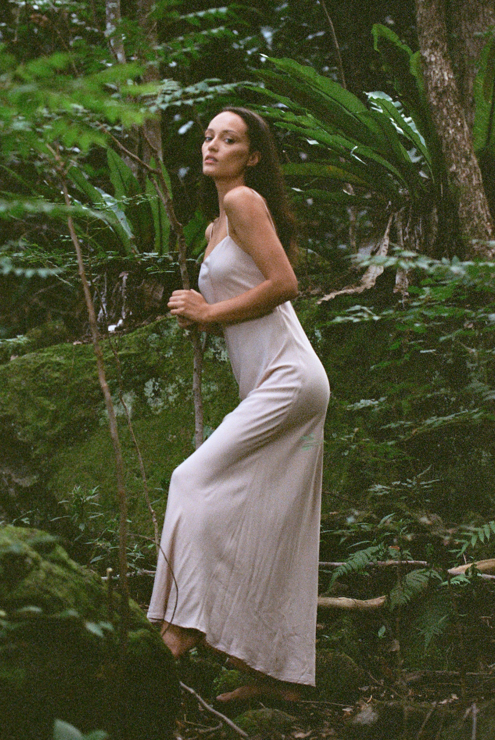 Bias cut midi slip in ballet pink with a flattering silhouette and a tie back detail for an adjustable fit. The perfect slip in our signature eco friendly fabric.